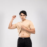 Person wearing a beige t-shirt and black HIELABS boxers with an elastic waistband.