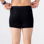 Person is wearing black HIELABS Coolism Trunks for everyday comfort. 
