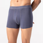 Person wearing grey HIELABS Coolism Trunks featuring a smooth fit and supportive elastic waistband.