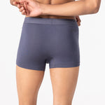 Person wearing grey HIELABS Coolism Trunks featuring a smooth fit and supportive elastic waistband.